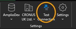 Jet Reports ribbon Settings group showing data source AmplioDev, company CRONUS UK Ltd and a Test Connection button.